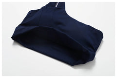 Conjunto Fitness Feminino com Top Ombro Só e Saia com Shorts