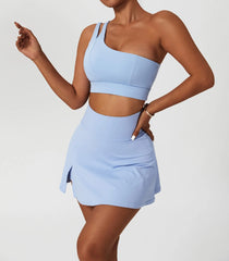 Conjunto Fitness Feminino com Top Ombro Só e Saia com Shorts