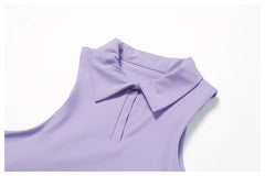 Conjunto Fitness com Cropped Gola Polo e Saia Shorts Plissada