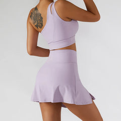 Conjunto Fitness Ombro Único com Saia Shorts