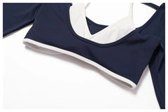 Blusa Fitness Manga Longa com Recorte Frontal e Costas Vazadas