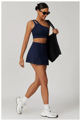 Conjunto Fitness Feminino com Top Ombro Só e Saia com Shorts