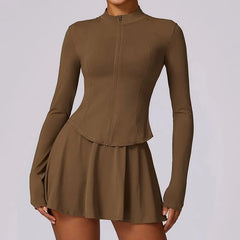 Vestido Fitness com Manga Longa e Saia Rodada