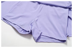Vestido Esportivo com Saia Plissada