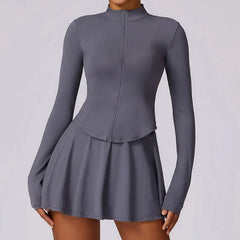 Vestido Fitness com Manga Longa e Saia Rodada