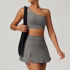 Conjunto Fitness Feminino com Top Ombro Só e Saia com Shorts